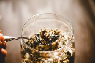A spoon with herbal tea
