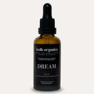 Brown glass dropper bottle labeled 'DREAM' on a neutral background