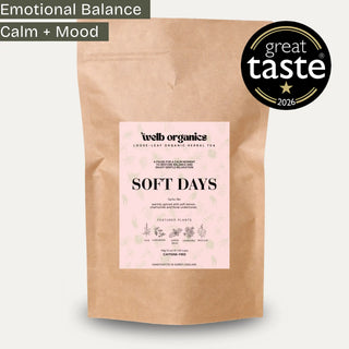 A kraft paper stand-up pouch of Welb Organics Soft Days herbal tea with a light pink label, shown on a light gray background with a black 'great taste 2026' badge in the top right corner.