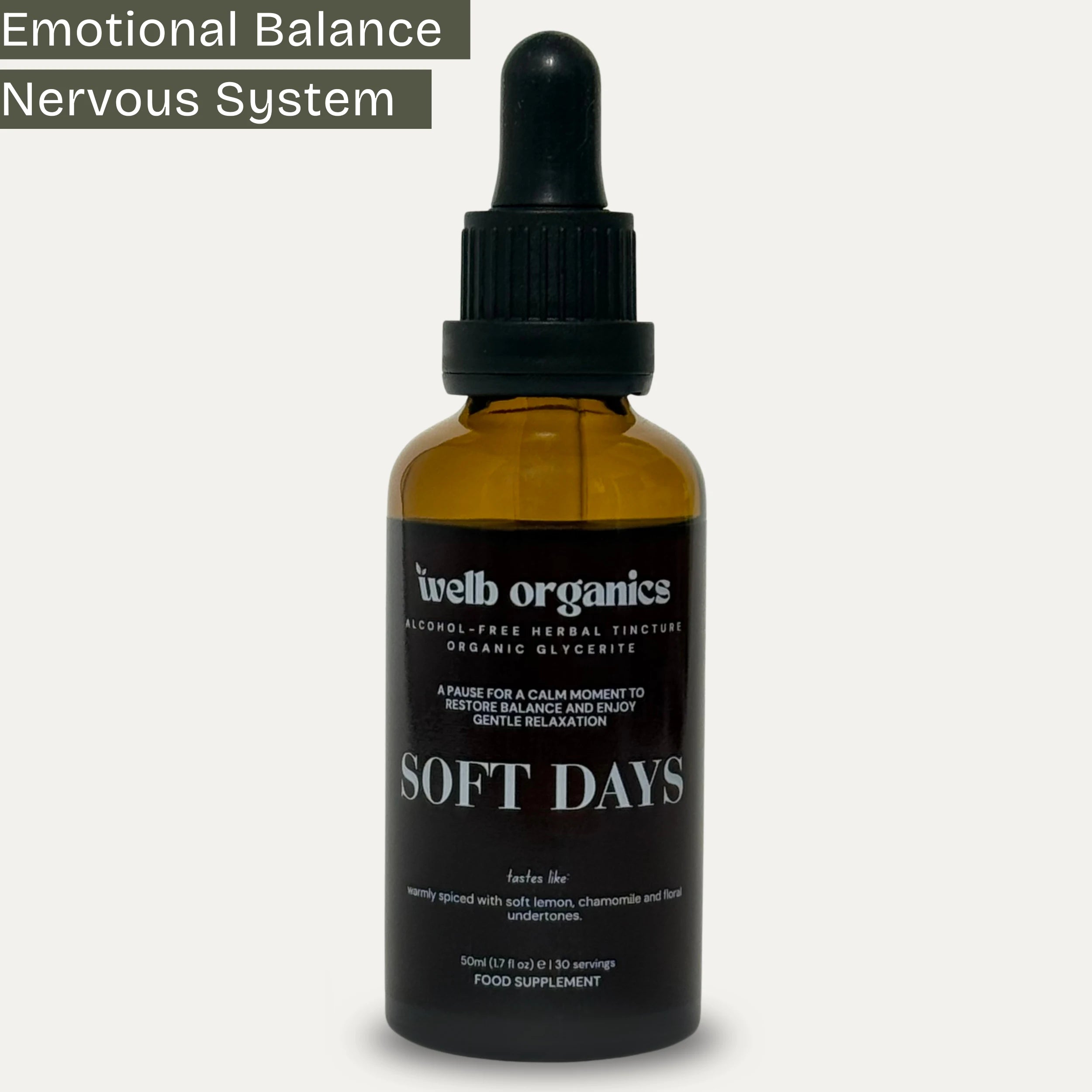 Brown glass bottle with dropper labeled 'Soft Days' on a neutral background